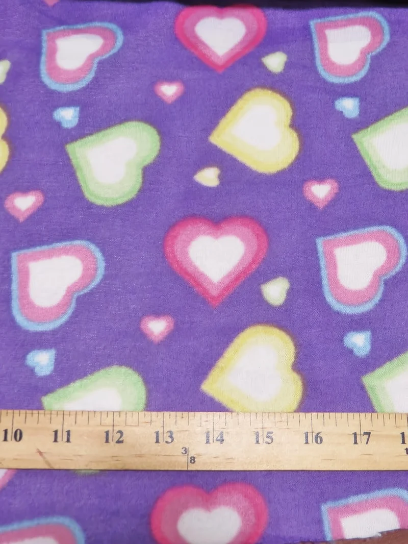 Falling For Hearts Purple Fleece Fabric
